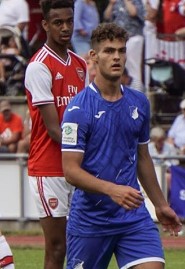 Nigerian-born defender Awe reveals how Arsenal snatched him from London rivals